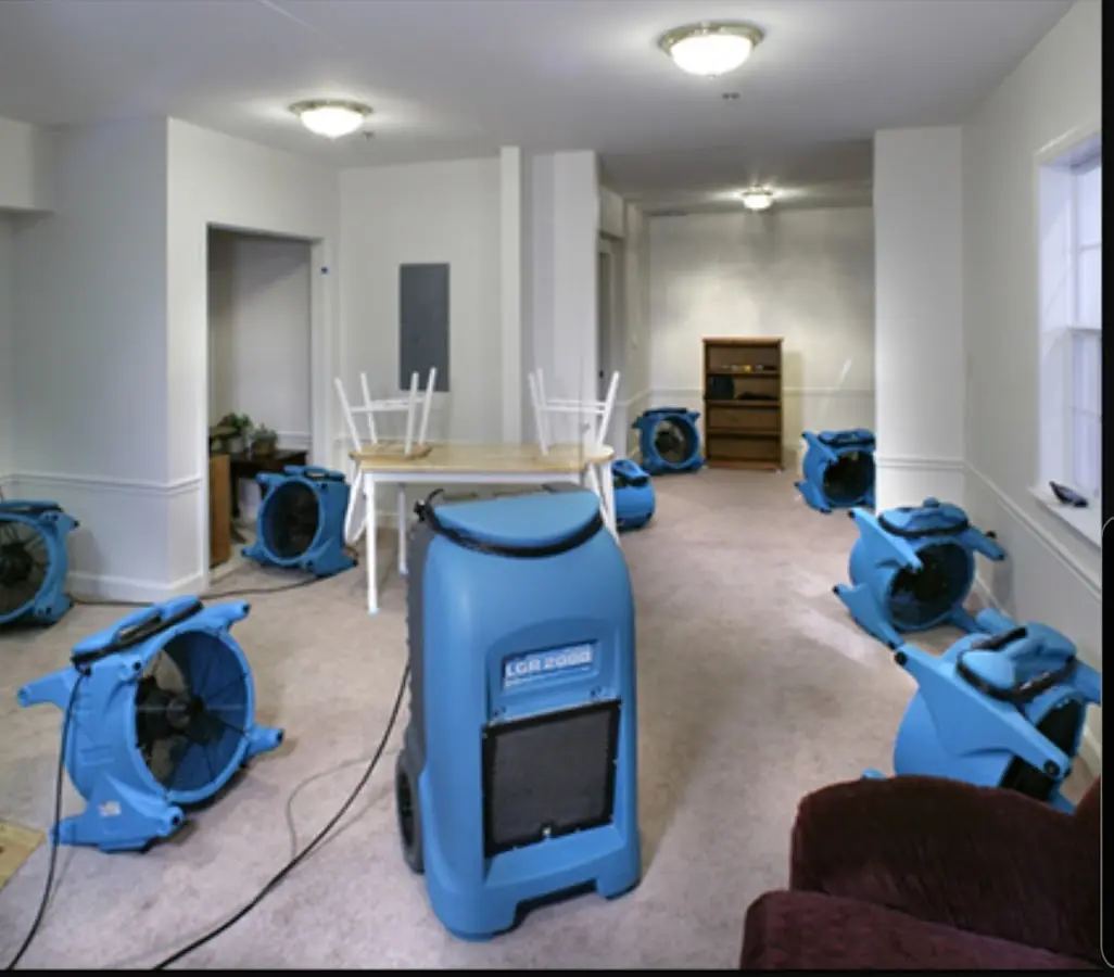 Air movers and dehumidifier setup for Water Damage Restoration in Fulton
